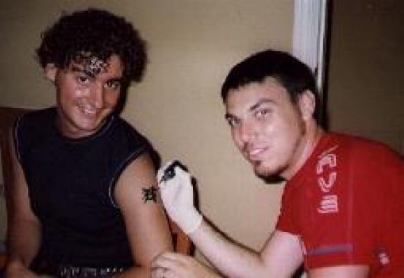 Luciano dibujando Tattoo