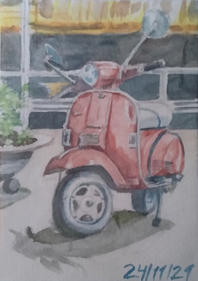 Vespa en el paseo del Puerto Deportivo