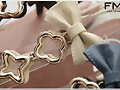 Sandalias planas con lacito (detalle ornamento)