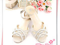 Sandalias de cu&ntilde;a Miss Dora, en blanco (detalle)