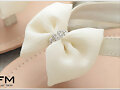 Sandalias planas con lacito, en blanco (detalle)