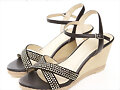 Sandalias cu&ntilde;a en X, en negro (lateral)