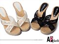Sandalias cu&ntilde;a en X, en blanco y en negro