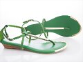 Sandalias planas de dedo verde vegetal