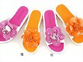 Chanclas plataforma con flor, en rosa y en naranja