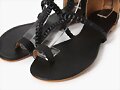 Sandalias planas tal&oacute;n cubierto, en negro (det. fr