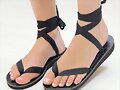 Sandalias planas de lazo, en negro (front.)