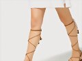 Sandalias planas centuri&oacute;n de tiras en marr&oacute;n