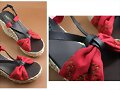 Sandalias cu&ntilde;a, en rojo y tiras negras (detalle)