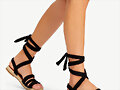Sandalias planas tiras tela en negro