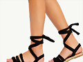 Sandalias planas tiras tela en negro
