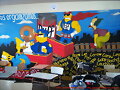 Bandera de egresados Simpsons en monta&ntilde;a rusa