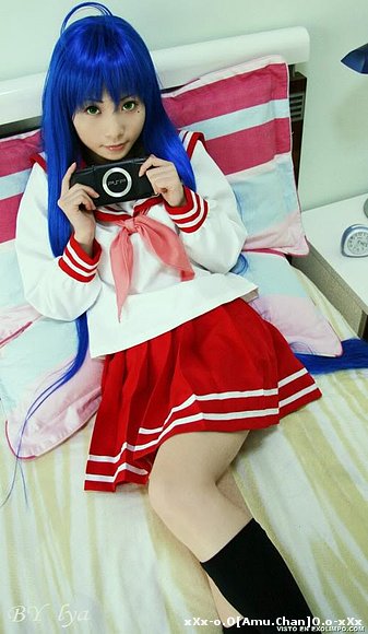 Kona-Chan <3 ¿con la PSP? o.o