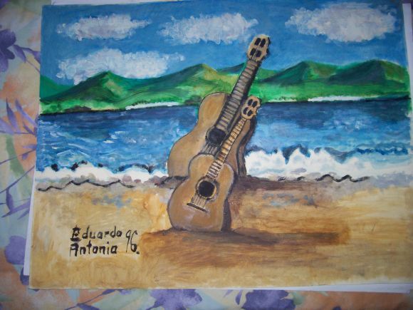 DOS GUITARRAS ENTERRADAS EN LA ARENA - EDIBLAN