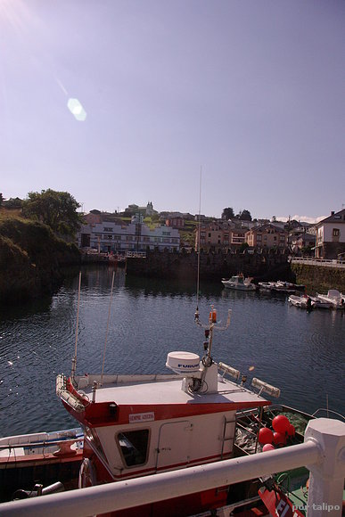 Con Santa Marina, al fondo
