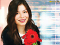 miranda cosgrove guapisima con una flor