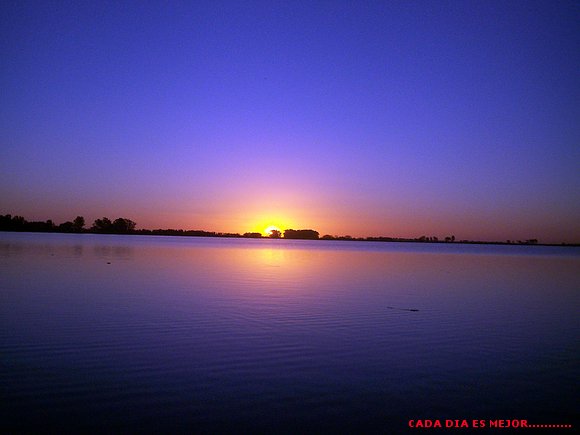 NAVARRO.... UNA PUESTA DE SOL ... LA  LAGUNA ..