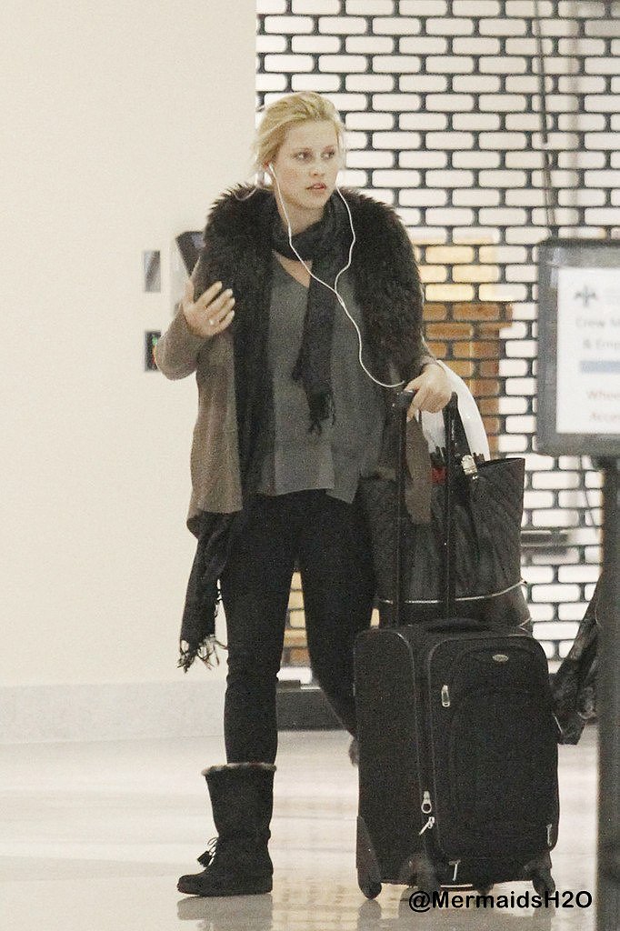 Claire Holt arrive in New Orleans (March 2013)