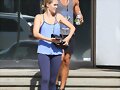 Claire Holt y su hermano Alex saliendo de gym 2014