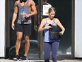 Claire Holt y su hermano Alex saliendo de gym 2014
